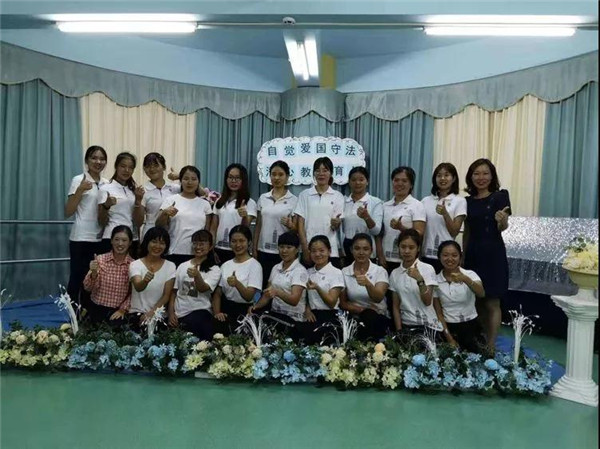 自覺愛國(guó)守法，潛心教書育人